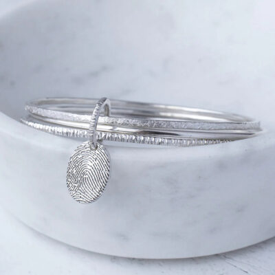 G. Seller memorial product: KS03 - Triple Hammered Bangle With Fingerprint Charm photo