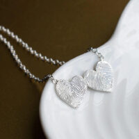 A photo of the KS09 - Double Heart Necklace Memorial from G. Seller